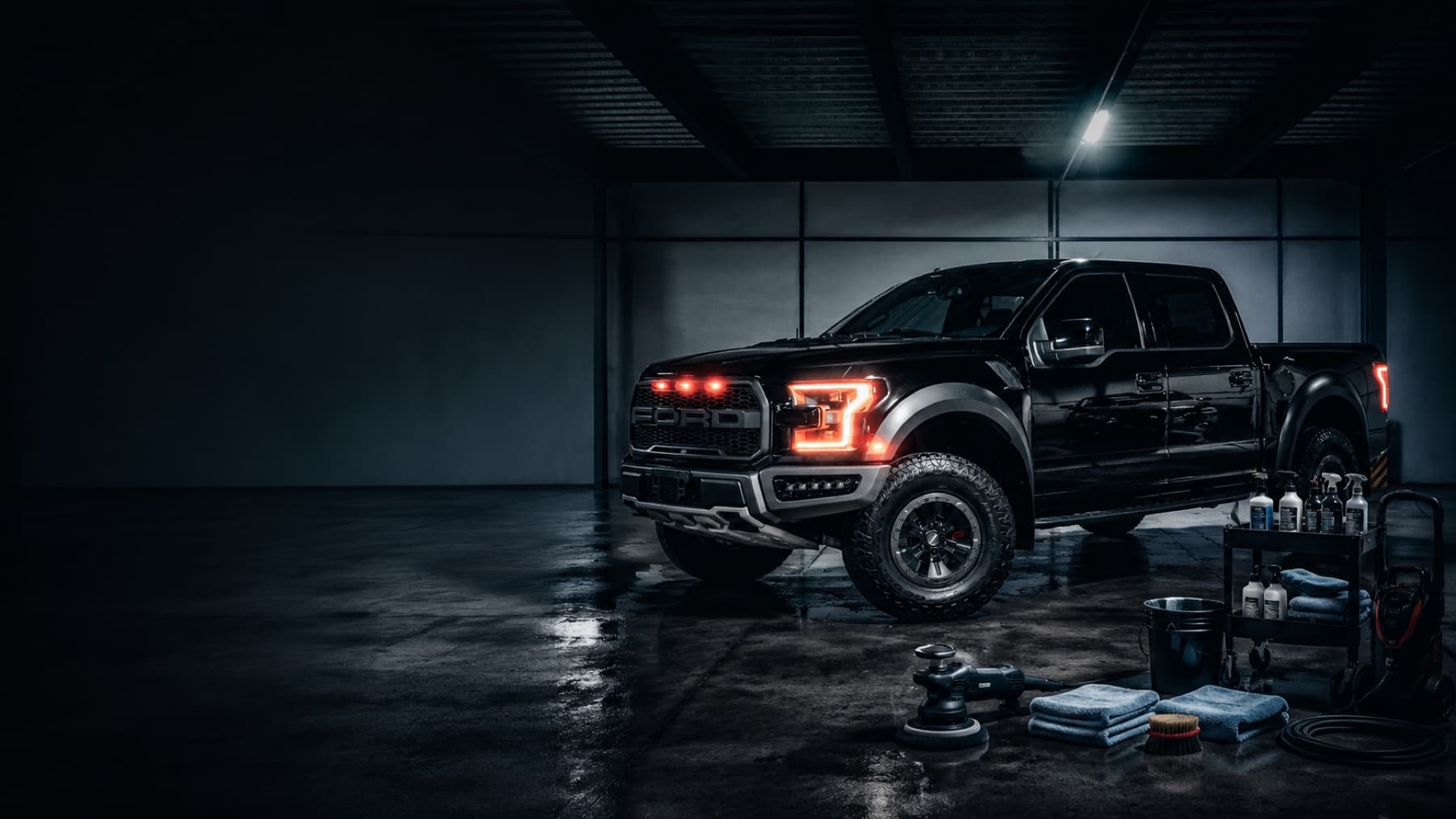 A professionally detailed black truck